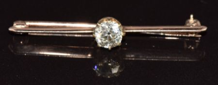 A 9ct rose gold brooch set with an old cut diamond of approximately 0.8ct, 2.7g, 4.2cm