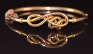 Edwardian 9ct gold love knot bangle, 8.3g, 5 x 6cm