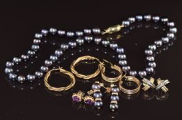 Four pairs of 9ct gold earrings including one pair set with amethysts (7.6g) and a pearl necklace
