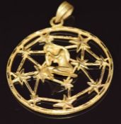 An 18ct gold bespoke pendant in the form of a network of stars with figure of a woman to the centre,