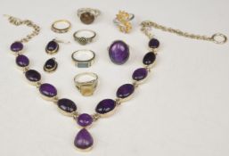 A 9ct gold ring set with amethysts and cubic zirconia (1.7g), silver necklace, earrings and ring set