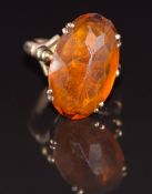 A 9ct rose gold ring set with paste, 7.7g, size N