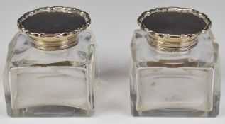 Pair of Edward VII hallmarked silver topped glass inkwells, London 1904, maker C S Harris & Sons
