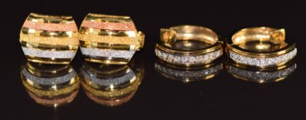 A pair of tri-coloured 18ct gold earrings (3g) and a pair of 9ct gold earrings set with topaz (2g)