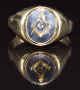 A 9ct gold ring signet ring with swivel centre to be blank or a Masonic symbol, 5.8g, size T