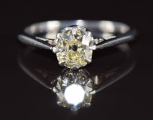 A platinum ring set with a 1.1ct old cut fancy light yellow diamond, with certificate, 3.3g, size N