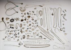 A collection of silver jewellery including Victorian Scottish brooch set with agate, bangle,