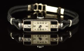 Art Deco platinum ladies wristwatch with 0.06ct old cut diamonds and onyx set to the case, blued