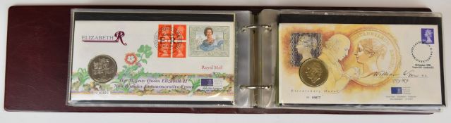 An album of coin covers to include Transport, Sporting, Military, Social, Royal Commemoratives etc