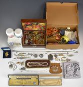 A collection of jewellery including two silver gilt bangles, seven cloisonné bangles, Miracle