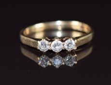 A 9ct gold ring set with three diamonds, each approximately 0.09ct, size J, 1.5g