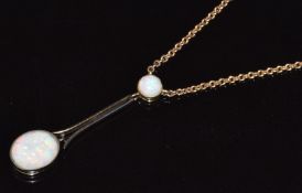 An Edwardian 9ct gold necklace set with a round and oval cut cabochon, 4.3g, 38cm