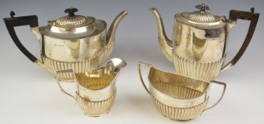 Harlequin early 20thC hallmarked silver tea and coffee set comprising teapot, coffee pot, sugar bowl