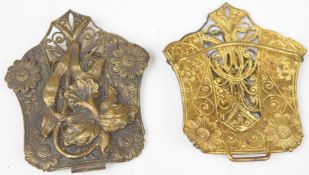 Art Nouveau gilt metal belt buckle decorated with lilies, width 11.5cm