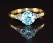 A c1940 18ct gold ring set with a round cut zircon and diamonds, 3.5g, size M