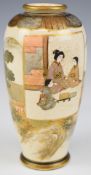 Japanese Satsuma vase decorated with seated figures and landscape, with seal mark to base, height