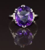Art Deco 18ct white gold ring set with an oval cut amethyst of approximately 9ct and baguette cut
