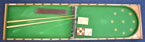 A mahogany cased folding Bagatelle table with boxwood and ebony inlay by E.J Riley Ltd Accrington,