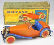 Meccano tinplate Two-Seater Sports Car with red body and hubs and blue wheel arches, bumper and