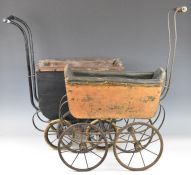 Two early 20th century doll's prams, one with Silver Cross markings, tallest 69cm.