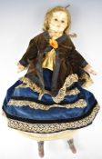 Early Victorian wax on composition doll with stuffed body, fixed blue glass eyes, pink lips,