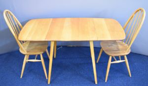 Ercol light elm mid century modern drop leaf table and two chairs, W135 x D75 x H71cm