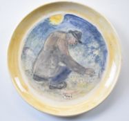 Reg Gammon (1894-1997) hand painted ceramic plate The Poacher, initialled to front RG and with