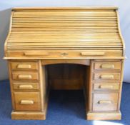 Early 20thC oak twin pedestal desk with fitted interior of drawers and cubbyholes, W125 x D74 x