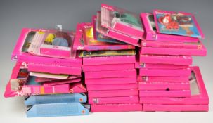 Thirty-five Mattel Barbie clothing and accessory sets, all in original packaging.