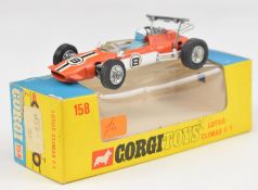 Corgi Toys diecast model Lotus-Climax F/1 racing car with orange/white body, silver hubs, blue
