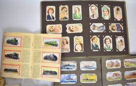 A large collection of cigarette cards in albums and loose, including Turf Railway Locomotives,