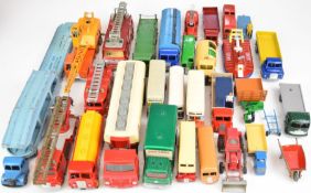 Twenty nine vintage Dinky Toys diecast model trucks and buses to include AEC Monarch Thompson