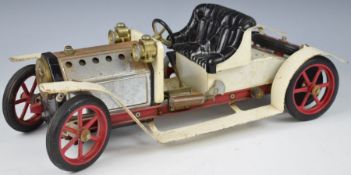 Mamod live steam roadster car with white body, black seat and red spoked wheels, length 40cm.