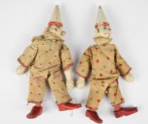 Two early 20th century Schoenhut wooden clowns in original costumes, height 20cm.
