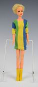 Mattel Twiggy Barbie doll wearing a blue/green/yellow striped dress and yellow boots, c.1967, height