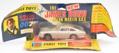 Corgi Toys diecast model James Bond 007 Aston Martin DB5 with silver body, red interior, opening
