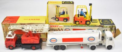 Three Dinky Toys diecast models comprising Jones Fleetmaster Cantilever Crane 970, AEC Fuel Tanker