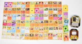 Approximately 750 Pokemon cards, mostly 2016-2019, together with a Hidden Fates collectors tin.