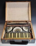 Rinaldi Milan, Italy 120 bass piano accordion, with red marbled finish, in hard case