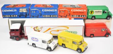Four Lion Toys 1:43 scale diecast model Commer vans together with a Lion Car DAF Trucks Trekker with