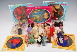 A collection of Matchbox Lesney pocket dolls including Suky House Cleaning playset and Disco