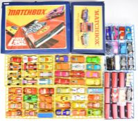 Two Matchbox diecast model collector's cases comprising 48 and 24 compartment versions, both with