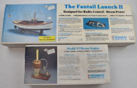 The Fantail Launch II steam powered radio controlled wooden boat kit and Model VI Steam Engine, both