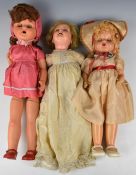 Three 1930's or 1940's composition dolls with jointed limbs, weighted eyes, brown or blonde hair,