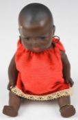 A small bisque baby doll, stamped Heubach Koppeldorf 399-17/0 Germany to neck with fixed black glass