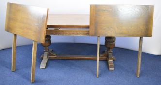 Oak refectory table with carved frieze and two extending leaves, W183 (extended 264) x D92 x H76cm