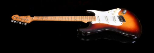 1958 Fender Stratocaster electric guitar made in the USA with three-tone sunburst body, serial