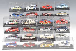 Thirty-four diecast model rally cars by Atlas Editions or similar, to include Subaru Impreza WRC,