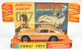 Corgi Toys James Bond Aston Martin DB5 with gold body, red interior, opening roof, ejector seat