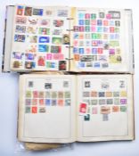 The Strand and Swiftsure stamp albums containing GB and world stamps